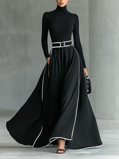 Gina | Vestido maxi negro con costuras blancas y cuello alto