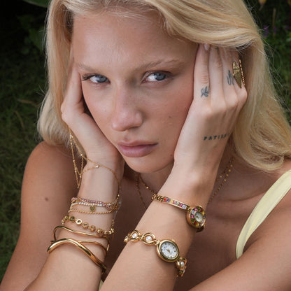 Celina · Reloj de Mujer Dorado con Brazalete Ajustable